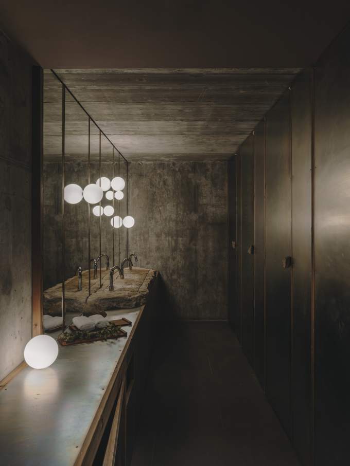 Carulla’s design for the property’s restaurant, Esperit Roca, embraces soft, muted earth-tones with concrete walls, stone accents and warm lighting to create a space that evokes an understated sophistication and a welcoming atmosphere. In the bathrooms, they selected the Tura Roca Rimless® wall-hung WC, designed by Carulla, for a cohesive aesthetic. Like the restaurant itself, the sculptural design of the WC is inspired by the Mediterranean landscape of the region. They also selected the Loft electronic mixer, which integrates naturally into a rough-hewn stone basin. The almost industrial form of the faucet complements the rawness of the stone and darkened space, while the electronic technology provides water efficiency and simplicity.3