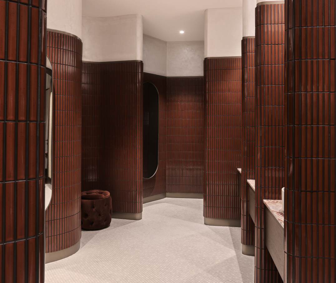 The bathrooms are the most private spaces in the restaurant and the design is about curves, cohesion and comfort. The Inspira round over countertop Fineceramic® basin provides an organic, circular counterpoint to the bathroom’s unique wave-like tiled walls. The choice L30-E electronic basin mixer adds further design elements with a nod to water efficiency and sustainability, an underlying theme in the ‘Tree of Life’ concept. Accessories including the Cubica robe hook and Victoria wall-mounted toilet brush, are minimal and discreet yet provide an important function in the space. The Dama wall-hung Rimless WC with soft closing seat and cover is combined with the In-Wall PL10 Dual (One) flush plate for a contemporary look that complement the warm, natural rhythms of the bathroom.7