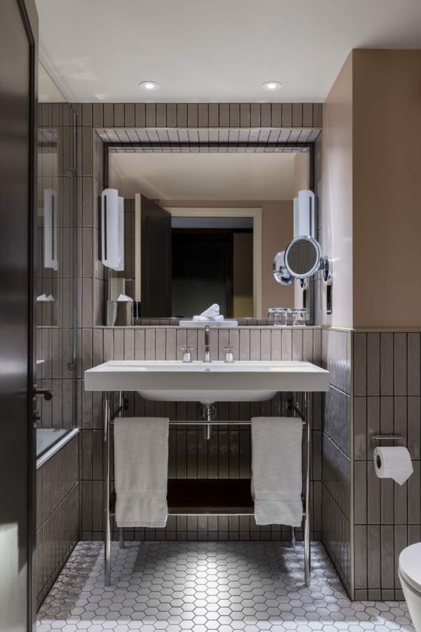The Ona wall-hung Roca Rimless® toilet and Fineceramic® basin were chosen for their functional design and innovative technology. The toilet enhances hygiene and space efficiency, while the Fineceramic® basin offers durability and sophisticated design. The Pyros Stonex® shower tray with its ultra-thin profile and discreet linear drain contributes to the neat aesthetic. This partnership exemplifies how thoughtful design and cutting-edge technology can enhance historic spaces, creating a timeless synergy between Victorian elegance and contemporary comfort.9