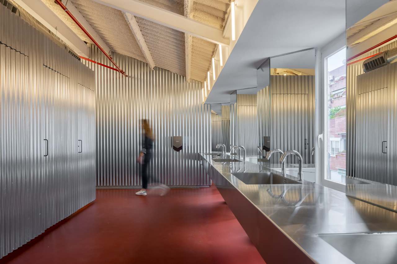 Forkstone’s transformation highlights the careful balance between preserving the building's historic character and meeting the needs of a modern office. The bathroom has been reimagined as a sanctuary for office workers, with undulating steel walls, red flooring and minimalist design elements. Roca’s Loft electronic faucets and Ona wall-hung WCs blend seamlessly into the overall design, adding comfort and practicality to this innovative workspace.7