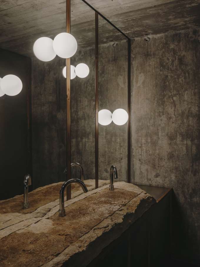 Carulla’s design for the property’s restaurant, Esperit Roca, embraces soft, muted earth-tones with concrete walls, stone accents and warm lighting to create a space that evokes an understated sophistication and a welcoming atmosphere. In the bathrooms, they selected the Tura Roca Rimless® wall-hung WC, designed by Carulla, for a cohesive aesthetic. Like the restaurant itself, the sculptural design of the WC is inspired by the Mediterranean landscape of the region. They also selected the Loft electronic mixer, which integrates naturally into a rough-hewn stone basin. The almost industrial form of the faucet complements the rawness of the stone and darkened space, while the electronic technology provides water efficiency and simplicity.4