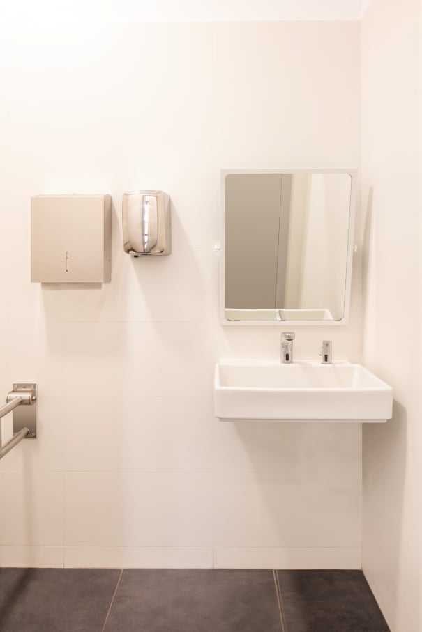 To update the bathrooms for contemporary demands while adhering to the integrity of the building, the products selected need to convey the modern ideals of its architecture and be accessible and inclusive. The linear and structural design of the wall-hung basins and the soft curves and stacked volumes of the Roca Rimless® wall-hung WC evoke timeless simplicity and the modernist ideals of Sert’s building. To accommodate all users, the Access collection was another essential product added into the bathrooms, including the Access WC seat and cover, comfort tilting mirror, grab bars and folding shower seat. The inclusion of public wall-mounted towel dispensers and waste bins enhanced the functionality of the space.18
