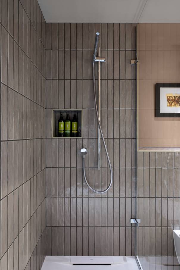 The Ona wall-hung Roca Rimless® toilet and Fineceramic® basin were chosen for their functional design and innovative technology. The toilet enhances hygiene and space efficiency, while the Fineceramic® basin offers durability and sophisticated design. The Pyros Stonex® shower tray with its ultra-thin profile and discreet linear drain contributes to the neat aesthetic. This partnership exemplifies how thoughtful design and cutting-edge technology can enhance historic spaces, creating a timeless synergy between Victorian elegance and contemporary comfort.12