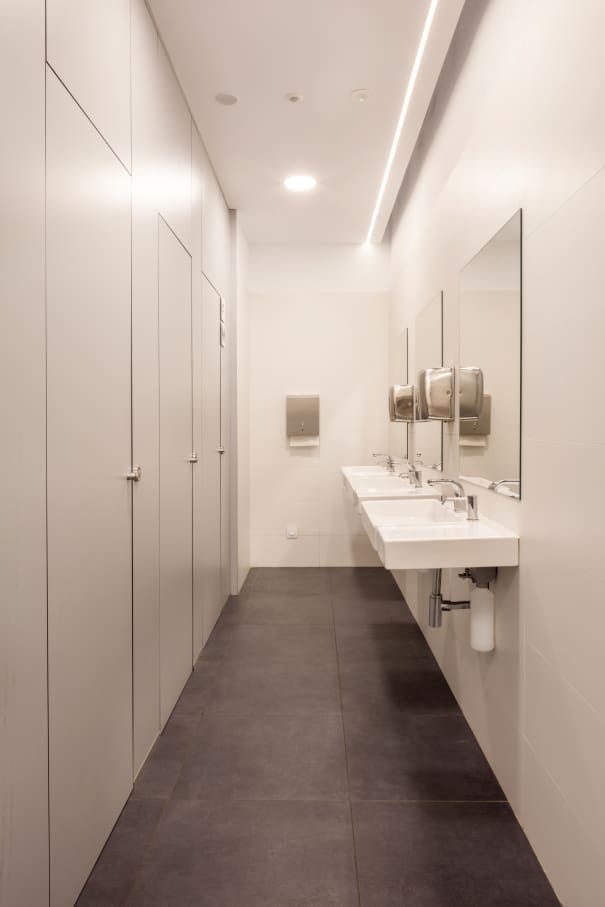 To update the bathrooms for contemporary demands while adhering to the integrity of the building, the products selected need to convey the modern ideals of its architecture and be accessible and inclusive. The linear and structural design of the wall-hung basins and the soft curves and stacked volumes of the Roca Rimless® wall-hung WC evoke timeless simplicity and the modernist ideals of Sert’s building. To accommodate all users, the Access collection was another essential product added into the bathrooms, including the Access WC seat and cover, comfort tilting mirror, grab bars and folding shower seat. The inclusion of public wall-mounted towel dispensers and waste bins enhanced the functionality of the space.15