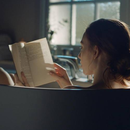 woman reading bathroom